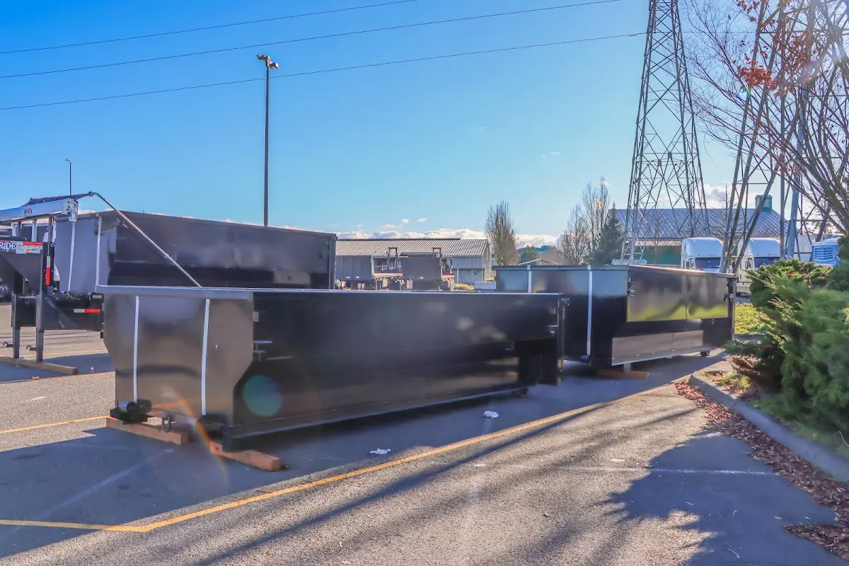 Roll-off dumpster ready for waste disposal at job site for 15 Yard Dumpster Rental in Diamondhead